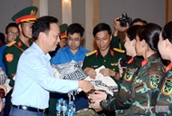 Military units present gifts to forces performing mission A80